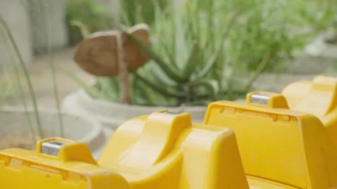 Waste bin and planter in a local recycle center in Bangkok, Thailand Stock Footage 247114471