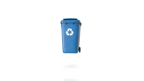 Waste bin falling onto white floor and its flap opening Stock Footage 115627044