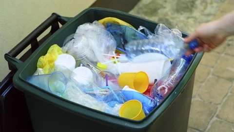 Waste bin full of plastic waste ready for recycling Stock Footage 136437918