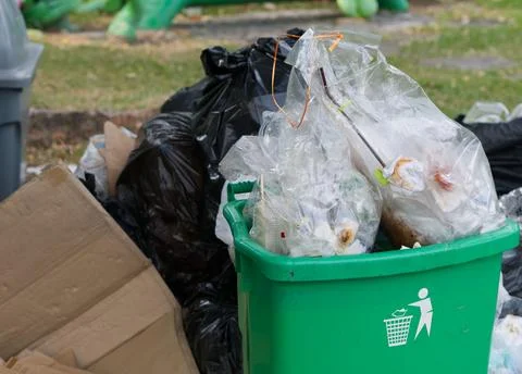 Waste Bin with Overflowing Garbage Stock-Fotos