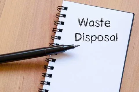Waste disposal write on notebook Stock Photos