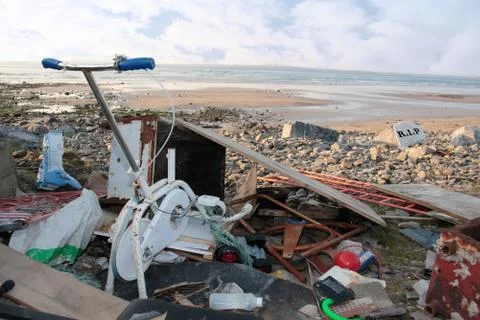 Waste dumped on a beach Stock Photos