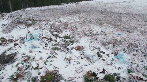 Waste dumping in the forest area in the snow Stock Footage 170918238