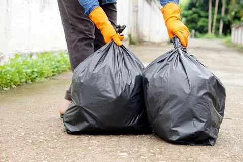 Waste management. Environment problems. Daily chores. Throw away rubbish . Stock Photos