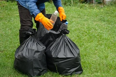 Waste management. Environment problems. Daily chores. Throw away rubbish . Stock Photos