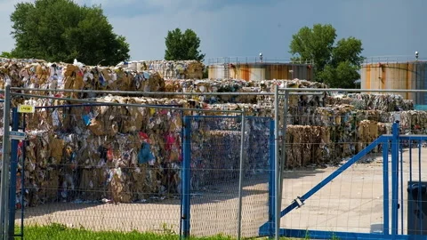 Waste Management Facility in Belgrade. Squeezed Material in Blocks. Recycling Stock Footage 259394469