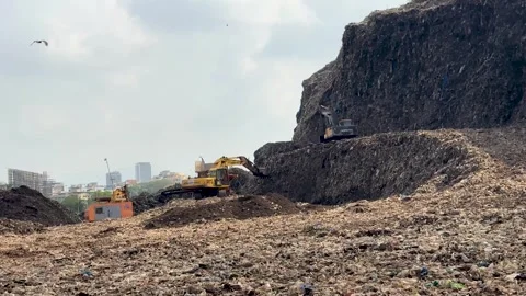 Waste Management Machinery Working on Large Garbage Dump Video 4K Vídeos de archivo 336942722