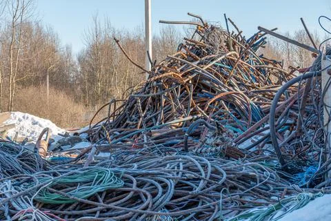 Waste of old copper cables in the shell. Photos