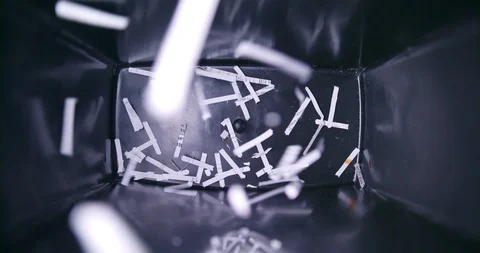 Waste paper basket filling with bits of shredded office paper Video stock 123736270