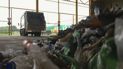 Waste processing plant. Garbage truck unload waste Stock-Footage 101287330
