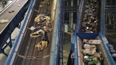 Waste processing plant. Waste on shipping tape. Waste sorting Stock Footage 101287386