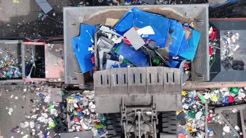 Waste recycling facility processes plastic waste from industrial sources Video stock 337910396