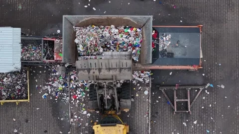 Waste recycling facility processes plastic waste and sorts materials Video stock 337984419