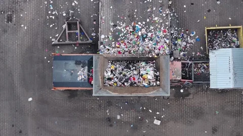 Waste recycling facility processes plastic waste for resource recovery Video stock 337984536