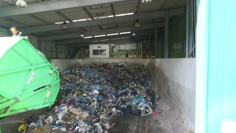 Waste segregation hall, workers, aerial view, slow motion Stock Footage 85290904