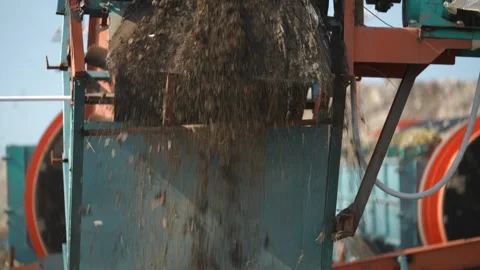 Waste Separation Machine Working Against Delhi City Skyline, India Stock Footage 248058307