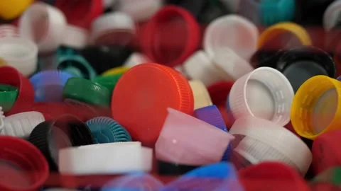 Waste sorting and recycling, care for the environment. Corks and caps from Stock Footage 172192139