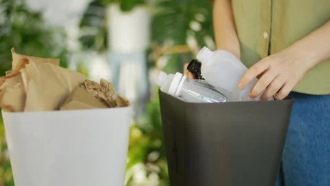 Waste sorting at home, sorting plastic rubbish for recycling. plastic, paper and Stock Footage 271381804