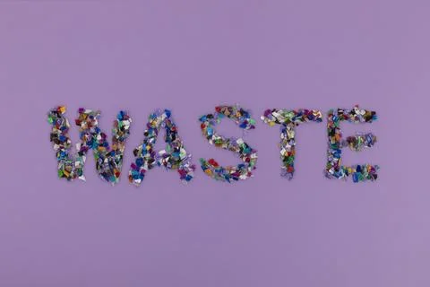 Waste text consisting of small plastic pellets collected from the sea water. Stock Photos