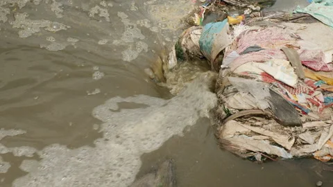 Waste, trash and garbage floated on a polluted river Stock Footage 139053012