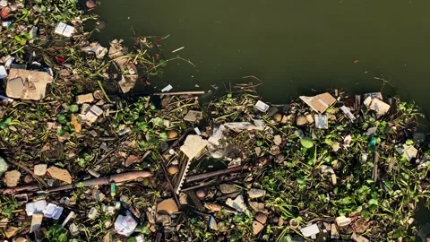 Waste trash Pollution in Saigon River, Ho Chi Minh City, Vietnam 4K Stock Footage 229540986