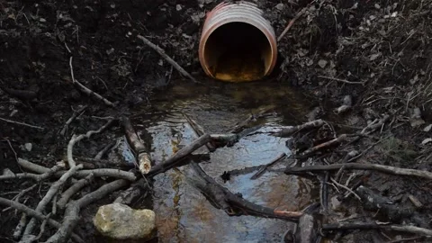 Waste water is draining from the drain pipe Stock Footage 158060033