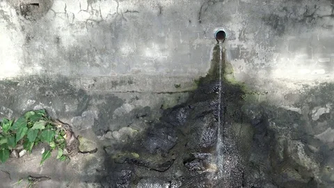 Waste water from pipe to the ground. Stock Footage 78213869