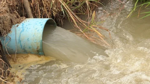 Waste water wastewater discharge into ri, Stock Video