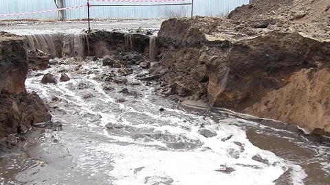 Wastewater pouring into the pit Stock Footage 83246932