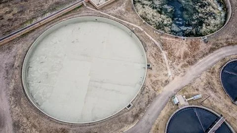 Wastewater Processing Tanks and Utility Buildings in Public Stock Photos
