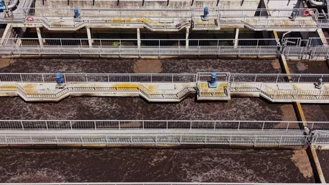 Wastewater treatment process at facility during sunny day Video stock 338405872