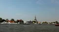 Wat Arun, Buddhist Temple of the Dawn in Bangkok, Thailand, Chao Phraya River HD Footage