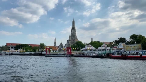 Wat Arun Buddhist temple seen from Chao Phraya river, Bangkok, Thailand 4K Stock Footage 175224699