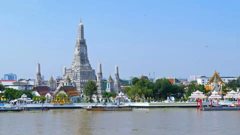Wat Arun Temple with Chao Phraya river in Bangkok, Thailand Stock Footage 142246804