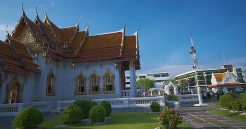 Wat benchamabophit buddhist temple sunset light blue sky sightseeing Stock Footage 311307831