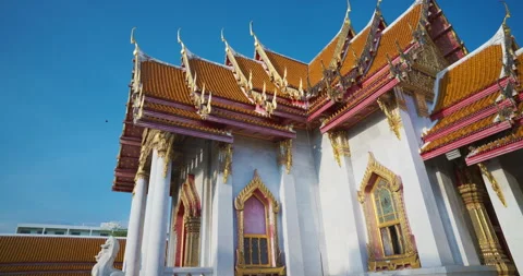 Wat benchamabophit buddhist temple sunset light blue sky sightseeing destination Stock Footage 311307872