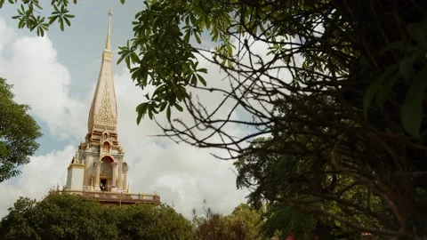 Wat Chalong under the crown of a tree, sunny weather in Phuket, Thailand Stock Footage 223820461