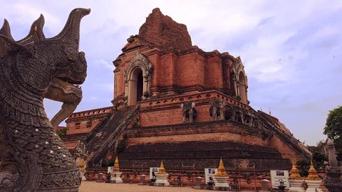 Wat Chedi Luang With Head of Dragon in Foreground, Thailand Stock Footage 112246535