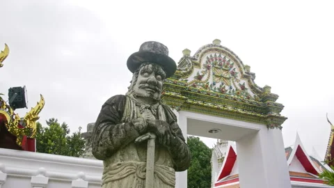 Wat Pho giant statue standing at a gate Stock Footage 229767510