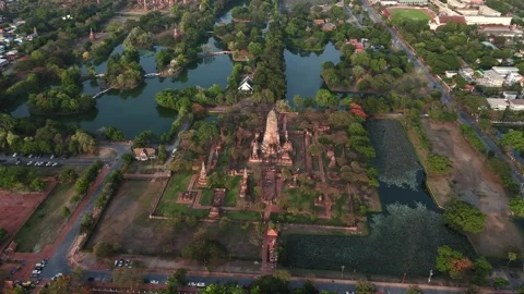 Wat Phra Ram temple site surrounded by ponds and gardens. Aerial approaching Stock Footage 312916554
