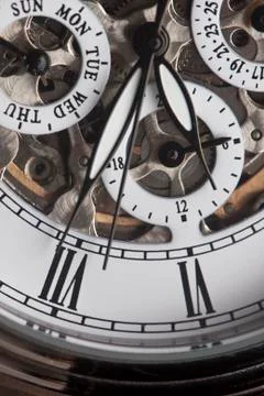 Watch and clock-hand Stock Photos