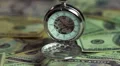Watch and money closeup, the pendulum of fate. Importance of time over finances HD Footage