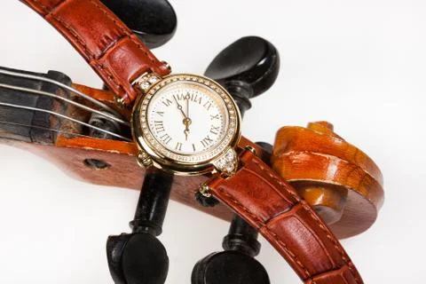 Watch And Violin Stock-Fotos