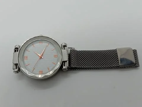 Watch closeup on gray background Stock Photos