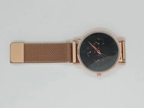 Watch closeup on gray background Stock Photos