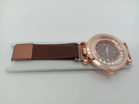 Watch closeup on gray background Stock Photos