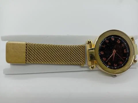 Watch closeup on gray background Stock Photos