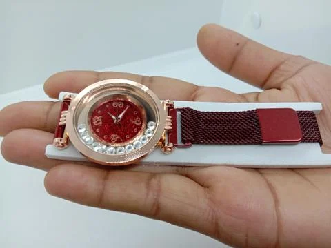 Watch closeup on gray background Stock Photos