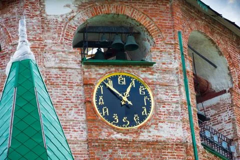 Watch, on the dial instead of numbers there are Slavic letters. Cathedral bel Stock Photos