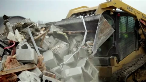 Watch an excavator skillfully demolish a structure with impressive precision Stock Footage 312172414